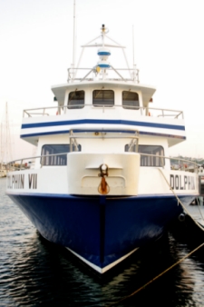 image of deep sea fishing boat in Provincetown harbor on Cape Cod