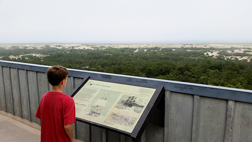 The view overlooking the Cape Cod National Seashore landscape from the observation deck at Provincelands Cape Cod Bike Trail